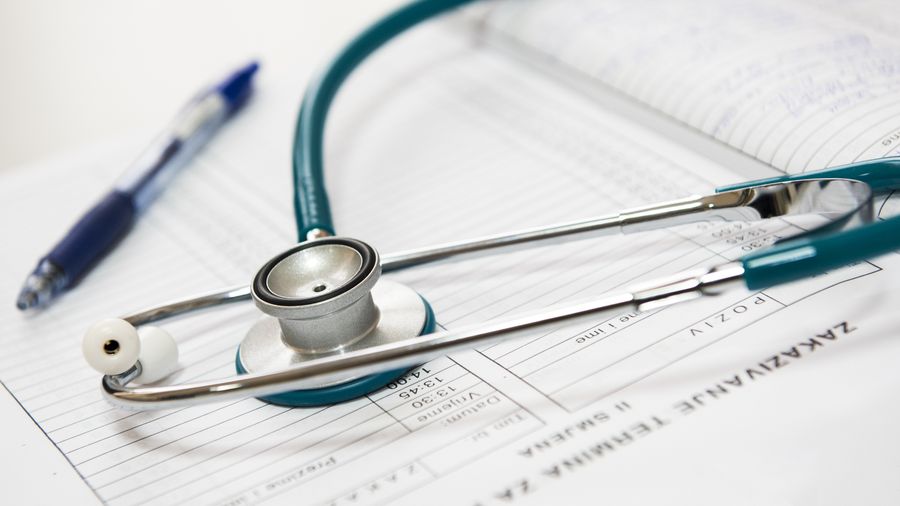 General practitioner in a bright, welcoming clinic environment